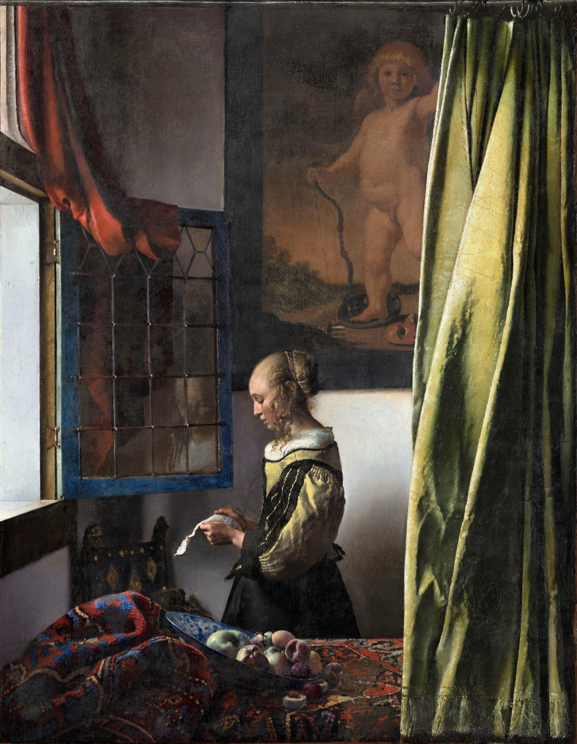 Muchacha leyendo una carta junto a una ventana abierta by Johannes Vermeer